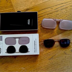 Nooz Optics Sunglasses.  Ultra slim, fits in your pocket. Never been worn.